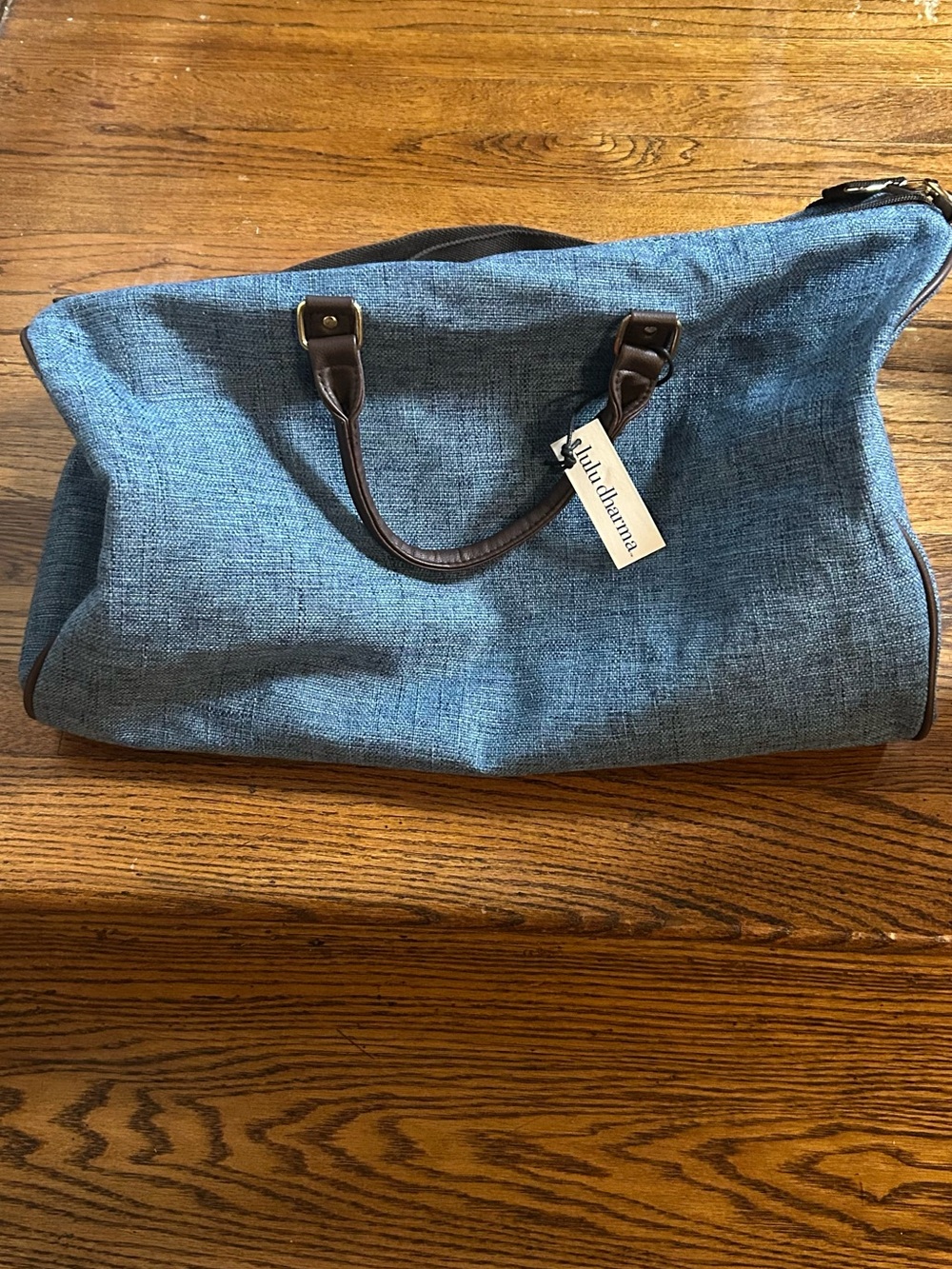 Lulu Dharma Women's Blue Canvas Travel Duffel with Brown Trim